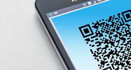 Новый сервис «Сбербанка» позволяет оплачивать покупки по QR-коду